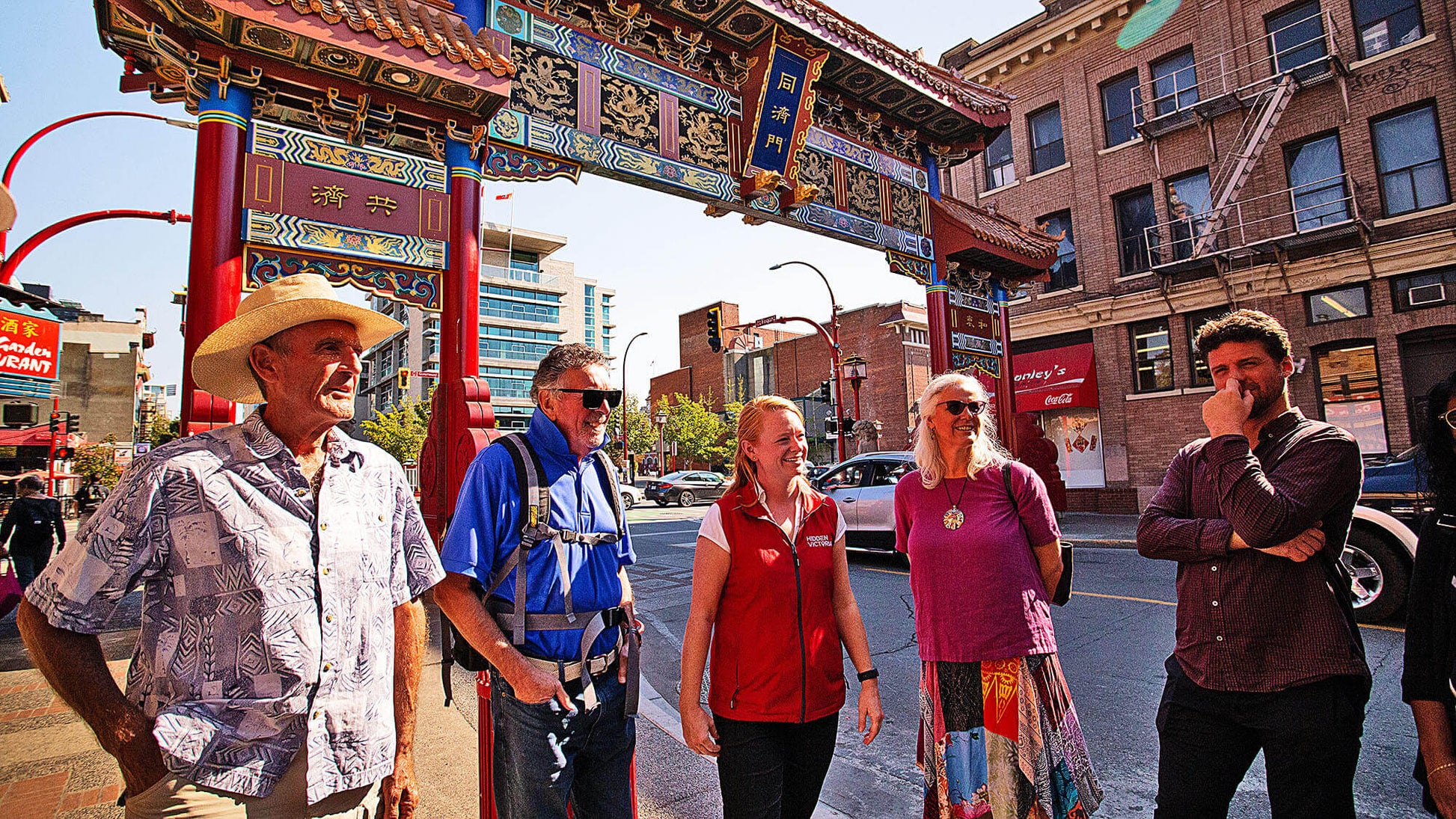 Group standing under Chinatown gates Victoria
